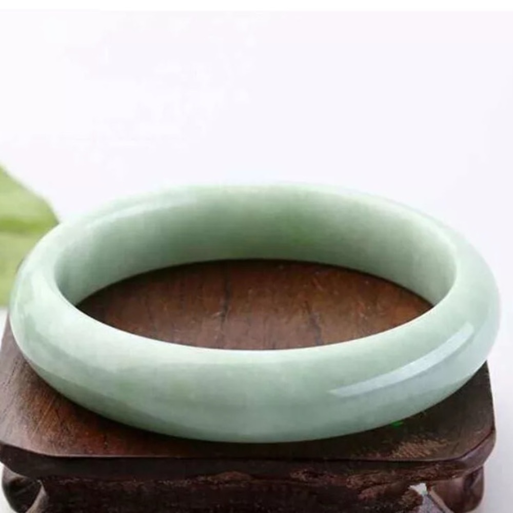 Natural untreated Jadeite Jade Light Green Bangle